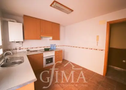 Casa adosada en venta con patio y garaje amplio en Argamasilla de Alba