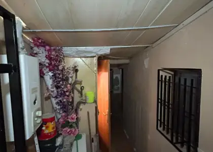 Casa habitable y tranquila con terraza en El Poblado en Puertollano