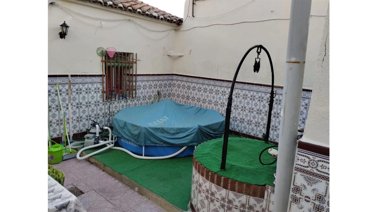 Chalet adosado en calle Perfecto Holgado